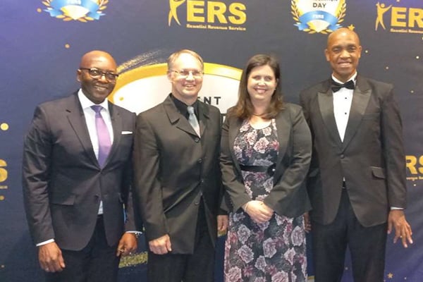 Official event photo (L-R) Business Eswatini CEO, Nathi Dlamini, with Greg and Ingrid Clarke from Trans World Radio, and Brightwell Nkambule, Commissioner General of Eswatini Revenue Services.