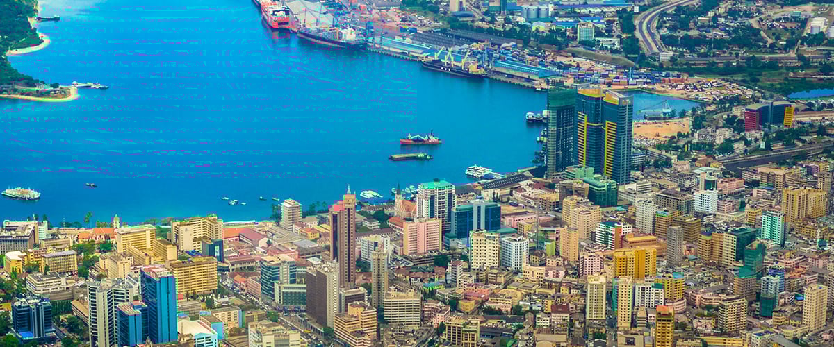 A Tanzanian city with an ocean/sea view.