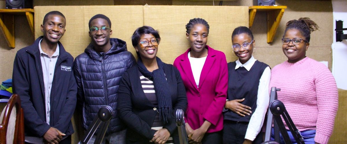 The production team of Reach4Life for Radio Capital, RTM Mozambique gathers at the studio in this June 2025 photo. From left: Ars&eacute;nio Nhamposse, Denzel Miguel, Maria Taibo, Ivat Matsinhe, Mamilia Zunguze and Ancha Jose. Taibo is program manager for RTM Mozambique. [Photo by Victor Kaonga, TWR]