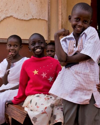 Children in Kenya laugh and pose for the camera