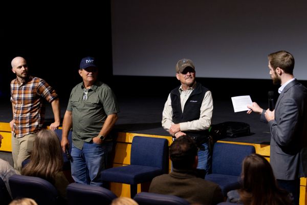 From left to right, Christian Schoen, Tom Schoen and Dan Schoen speak with TWR's Vice President of Digital Ministry, Tyler Church, at a live Q&A following the premiere of the documentary, Lifted.