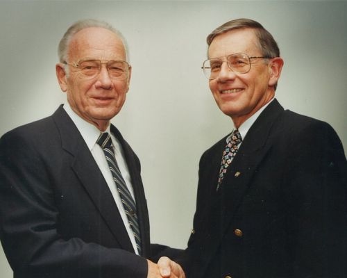 Dr. Paul Freed (left) turned over the TWR presidency to Tom Lowell (right) in 1994