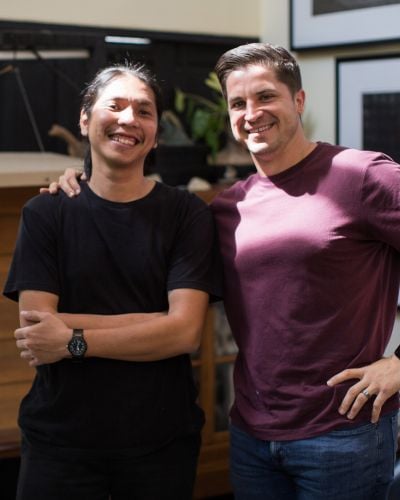 Josh Terndrup (right) stands alongside a local Thai artist (left)