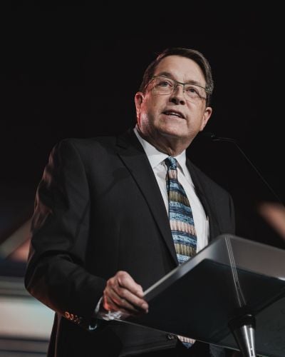TWR Interim President Cassius Smith accepts the NRB Preident's Award on behalf of former TWR President Lauren Libby