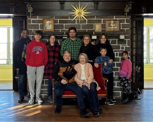 Steve and Barbara, alongside their children and grandchildren, at their retirement party [photo courtesy of Barbara Shantz]