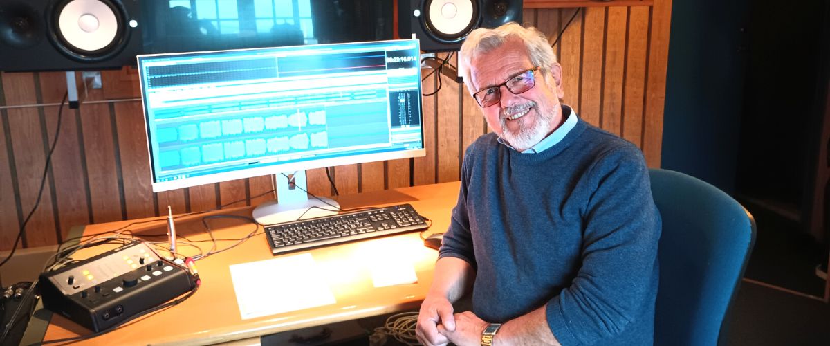 Jogvan Hammer, seen in EVR's newer studio in Torshavn, was the original producer of the EVR programs transmitted by TWR beginning in 1966. He still produces programs for EVR.