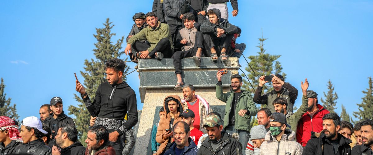 A gathering of the people and residents of Daraa city in Al-Karama and Al-Hurriya Square after the fall of Bashar Al-Assad